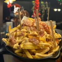 Patatine cheddar e pancetta croccante - IL TEATRO DEL GUSTO